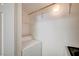 Utility closet featuring a stacked washer and dryer at 6955 N Durango Dr # 1093, Las Vegas, NV 89149