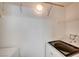 Utility closet featuring a stacked washer and dryer at 6955 N Durango Dr # 1093, Las Vegas, NV 89149