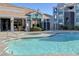 Community pool and hot tub with sunbathing space at 6955 N Durango Dr # 1093, Las Vegas, NV 89149