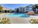 Large community swimming pool with rock feature in a well maintained community at 6955 N Durango Dr # 1093, Las Vegas, NV 89149