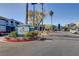 The Regent at Town Center signage surrounded by meticulously maintained landscaping and visitor parking at 6955 N Durango Dr # 1093, Las Vegas, NV 89149