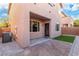 Home's backyard with grass, brick patio, block wall and gravel areas at 7342 Brisbane Hills St, Las Vegas, NV 89166