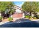 Charming home featuring an attached two car garage and a landscaped yard at 7342 Brisbane Hills St, Las Vegas, NV 89166