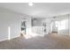 Upstairs loft area with neutral carpet and white railing at 7342 Brisbane Hills St, Las Vegas, NV 89166