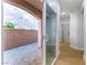 Sliding glass door leads to a private covered patio with brick pavers at 7342 Brisbane Hills St, Las Vegas, NV 89166