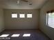 Spacious bedroom with multiple windows and ample natural light at 7517 Apple Cider St, Las Vegas, NV 89131