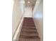 Carpeted staircase leading to the upper level of the home at 7517 Apple Cider St, Las Vegas, NV 89131