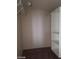 Empty walk-in closet with adjustable shelves at 7517 Apple Cider St, Las Vegas, NV 89131