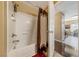 Bathroom with a shower and brown shower curtain at 7701 W Robindale Rd # 274, Las Vegas, NV 89113