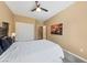 Comfortable bedroom with a ceiling fan and a large closet at 7701 W Robindale Rd # 274, Las Vegas, NV 89113