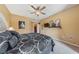 Bedroom featuring a fan, carpet, and furniture at 7701 W Robindale Rd # 274, Las Vegas, NV 89113