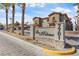 Beautiful community entrance with palm trees and desert landscaping, La Paloma at 7701 at 7701 W Robindale Rd # 274, Las Vegas, NV 89113
