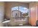 Outdoor patio with seating and view of nearby buildings at 7701 W Robindale Rd # 274, Las Vegas, NV 89113