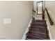 Stairway features attractive wood steps, leading upwards with a modern design and neutral color palette at 7701 W Robindale Rd # 274, Las Vegas, NV 89113