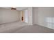 Large bedroom featuring neutral carpet, ceiling fan, and ensuite access at 7856 Carysford Ave, Las Vegas, NV 89178