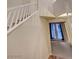 Hallway with staircase leading to second floor and door leading to balcony at 7856 Carysford Ave, Las Vegas, NV 89178
