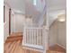 Bright staircase with wood and carpeted steps provides access to upper floor at 7856 Carysford Ave, Las Vegas, NV 89178