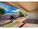 View of the backyard featuring a patio with view of a hill and surrounding landscape at 819 Sandsprings St, Henderson, NV 89011