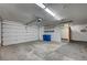 Spacious garage with white walls and a large garage door at 819 Sandsprings St, Henderson, NV 89011