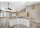 Bright kitchen featuring a cooking island, and open floor plan with ceiling fans, and lots of natural light at 819 Sandsprings St, Henderson, NV 89011