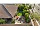 Inviting backyard retreat featuring a well-kept lawn, paved patio, seating, and lush landscaping for relaxing or entertaining at 8346 Vinamala Ave, Las Vegas, NV 89149