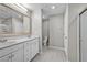 Bright bathroom with double sinks, large vanity, and plenty of counter space at 8346 Vinamala Ave, Las Vegas, NV 89149