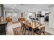 Open-concept living area combines dining and living spaces for a cohesive and inviting atmosphere at 8346 Vinamala Ave, Las Vegas, NV 89149