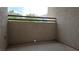 Balcony with concrete floor and stucco siding at 8725 W Flamingo Rd # 216, Las Vegas, NV 89147
