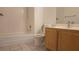 A full bathroom with tile floors, tub/shower combo, vanity, and toilet at 8725 W Flamingo Rd # 216, Las Vegas, NV 89147
