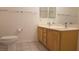 Bathroom with double sink vanity and tile flooring at 8725 W Flamingo Rd # 216, Las Vegas, NV 89147