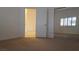 Bedroom featuring sliding mirrored closet doors and shuttered window at 8725 W Flamingo Rd # 216, Las Vegas, NV 89147