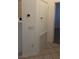 Hallway features a thermostat, light switches, and access to additional rooms at 8725 W Flamingo Rd # 216, Las Vegas, NV 89147