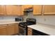 Kitchen featuring stainless steel appliances, light wood cabinets, and laminate countertops, ready for cooking at 8725 W Flamingo Rd # 216, Las Vegas, NV 89147