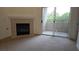 Inviting living room with fireplace and sliding glass doors to private outdoor balcony at 8725 W Flamingo Rd # 216, Las Vegas, NV 89147
