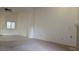 Open living space with tile and carpet flooring, plenty of natural light at 8725 W Flamingo Rd # 216, Las Vegas, NV 89147