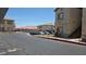 Apartment buildings with covered parking and a row of garages in the background at 8725 W Flamingo Rd # 216, Las Vegas, NV 89147