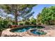 Inviting backyard pool and spa offer relaxation with golf course view at 9001 Opus Dr, Las Vegas, NV 89117