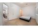 Bright, vacant bedroom boasts plush carpet, neutral walls, and a window for natural light at 9236 Whitekirk Pl, Las Vegas, NV 89145