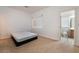 Cozy bedroom showcasing a bed frame, neutral walls, and a window for natural light at 9236 Whitekirk Pl, Las Vegas, NV 89145