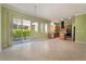 The kitchen includes a sliding glass door, tile flooring, and access to the backyard patio at 9236 Whitekirk Pl, Las Vegas, NV 89145