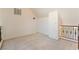 Carpeted loft area with a view to the exterior at 9236 Whitekirk Pl, Las Vegas, NV 89145