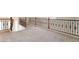 Open loft area with detailed railing overlooking the living space below at 9236 Whitekirk Pl, Las Vegas, NV 89145