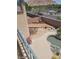 Private backyard featuring a pool, patio, and wood deck with views of mountains in the distance at 9622 Staff Ln, Las Vegas, NV 89178