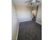 Neutral bedroom with carpet, tan walls, and a door leading to another room at 9622 Staff Ln, Las Vegas, NV 89178