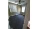 Bedroom with windows and plantation shutters and a ceiling fan at 9622 Staff Ln, Las Vegas, NV 89178