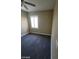 Small bedroom with a single window and plantation shutters at 9622 Staff Ln, Las Vegas, NV 89178