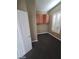 Bedroom showing a window with shutters with a built in nook and cabinets at 9622 Staff Ln, Las Vegas, NV 89178
