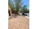 Paver driveway leading to a lovely home with desert landscaping at 9622 Staff Ln, Las Vegas, NV 89178
