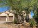 Beautiful two-story home with a tile roof, stucco exterior, and a spacious two-car garage at 9622 Staff Ln, Las Vegas, NV 89178