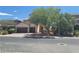 Charming home with a tile roof, stucco siding, and a convenient two-car garage at 9622 Staff Ln, Las Vegas, NV 89178
